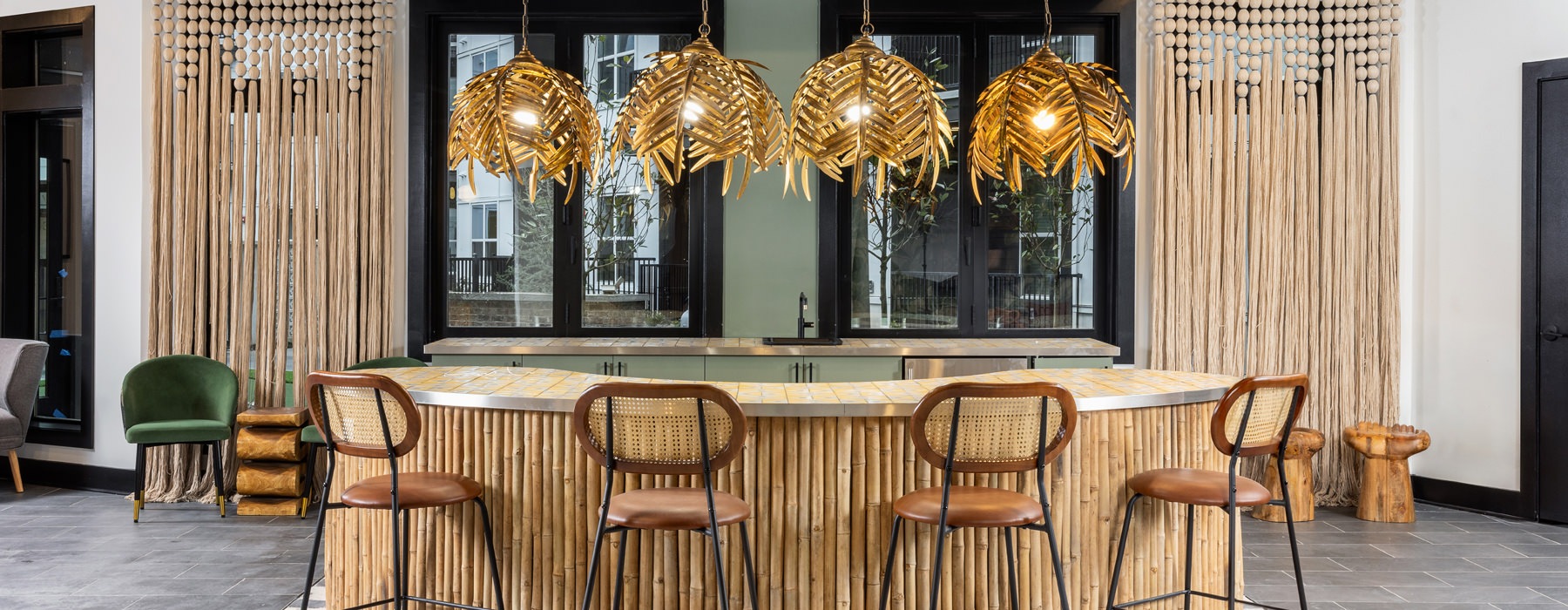 chairs around a table with hanging lights